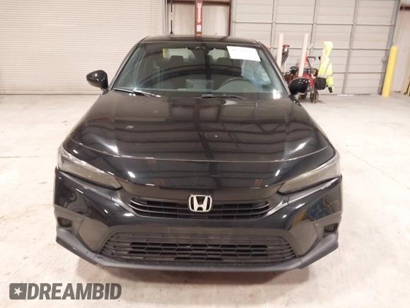2024 Honda Civic Sport with VIN 2HGFE2F59RH519889, listed as a IAAI auction lot 41598192 with 7,451 mi miles and . Bid and sale history available at DreamBid. Image 12.