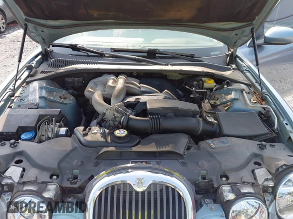 2004 Jaguar S-Type z VIN SAJEA01T64FN07825, wystawiony jako IAAI lot #42403796 z przebiegiem 133 011 mil mil oraz . Historia ofert i sprzedaży dostępna na DreamBid. Obrazek 10.