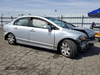 2010 Honda Civic LX with VIN 2HGFA1F57AH586100, listed as a Copart auction lot 50066965 with 192,401 mi miles and Salvage Title. Bid and sale history available at DreamBid. Image 4.