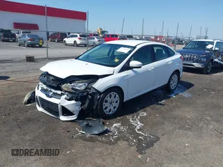 2012 Ford Focus SE with VIN 1FAHP3F20CL473141, listed as a IAAI auction lot 41776178 with 112,777 mi miles and . Bid and sale history available at DreamBid. Image 2.