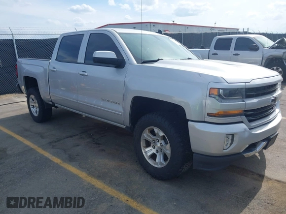 2017 Chevrolet Silverado 1500 LT with VIN 3GCUKREC5HG285689, listed as a IAAI auction lot 42055959 with 128,237 mi miles and . Bid and sale history available at DreamBid. Image 1.