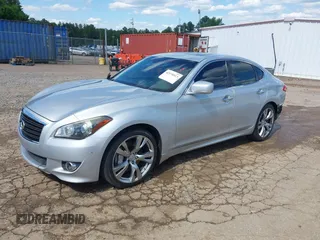 2013 Infiniti M with VIN JN1BY1AP0DM513527, listed as a IAAI auction lot 42170513 with 194,908 mi miles and . Bid and sale history available at DreamBid. Image 21.