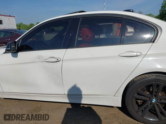 2013 BMW 3 Series 335i xDrive with VIN WBA3B9C54DF587421, listed as a IAAI auction lot 42165857 with 142,331 mi miles. Bid and sale history available at carsss.com. Image 14.