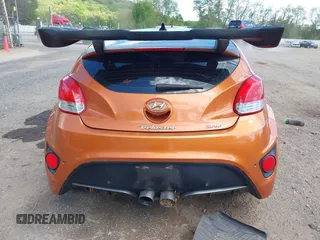 2013 Hyundai Veloster Turbo z VIN KMHTC6AE1DU101236, wystawiony jako IAAI lot #42230984 z przebiegiem 131 854 mil mil oraz . Historia ofert i sprzedaży dostępna na DreamBid. Obrazek 16.