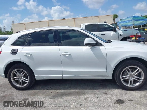 2014 Audi Q5 Premium Plus with VIN WA1LFAFP9EA124785, listed as a IAAI auction lot 42511649 with 99,109 mi miles and . Bid and sale history available at DreamBid. Image 13.