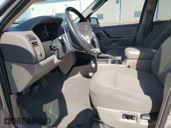 2003 Jeep Grand Cherokee Laredo with VIN 1J4GX48S43C516026, listed as a Copart auction lot 45264525 with 113,222 mi miles and Salvage Title. Bid and sale history available at carsss.com. Image 7.