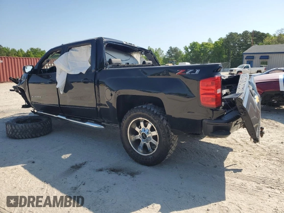 2018 Chevrolet Silverado 1500 LT with VIN 3GCUKRECXJG503244, listed as a Copart auction lot 52792825 with 107,029 mi miles and Salvage Title. Bid and sale history available at DreamBid. Image 2.