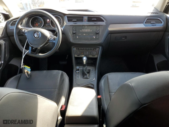 2020 Volkswagen Tiguan SE with VIN 3VV3B7AX2LM105721, listed as a Copart auction lot 79272814 with 59,887 mi miles and Salvage Title. Bid and sale history available at carsss.com. Image 8.
