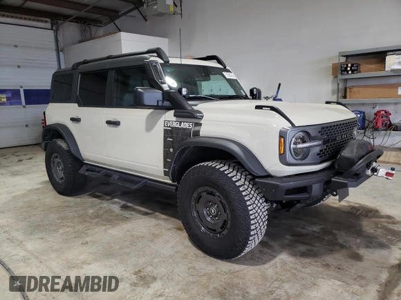 2022 Ford Bronco with VIN 1FMEE5DH7NLB58518, listed as a Copart auction lot 51950435 with 7,175 mi miles and Salvage title. Bid and sale history available at DreamBid. Image 4.