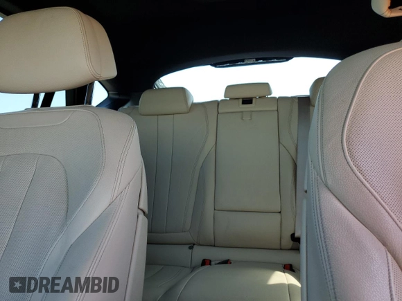 2018 BMW X6 sDrive35i with VIN 5UXKU0C5XJ0G69741, listed as a Copart auction lot 77366934 with 66,287 mi miles and Salvage Title. Bid and sale history available at carsss.com. Image 10.