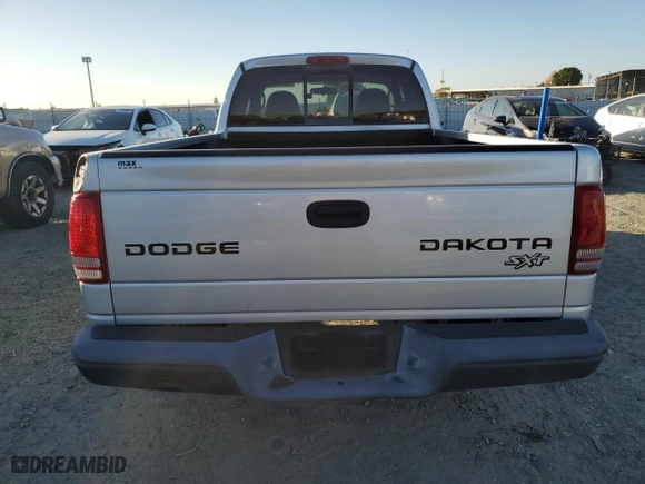 2004 Dodge Dakota with VIN 1D7GL12K64S533612, listed as a Copart auction lot 79676404 with 102,575 mi miles and Clean Title. Bid and sale history available at carsss.com. Image 6.