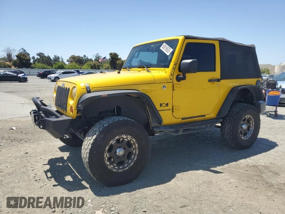 2008 Jeep Wrangler X with VIN 1J4FA24188L567678, listed as a Copart auction lot 60918635 with 185,368 mi miles and Salvage title. Bid and sale history available at DreamBid. Image 1.