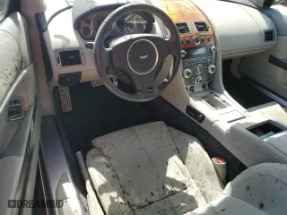 2009 Aston Martin DB9 with VIN SCFAD02E79GB10991, listed as a Copart auction lot 75089204 with 0 mi miles and Salvage Title. Bid and sale history available at carsss.com. Image 8.