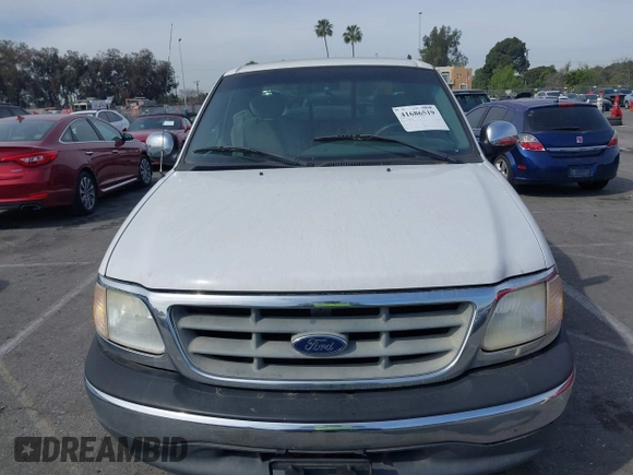2001 Ford F-150 XL with VIN 1FTRX07L91KA77460, listed as a IAAI auction lot 41686519 with 185,286 mi miles. Bid and sale history available at carsss.com. Image 6.