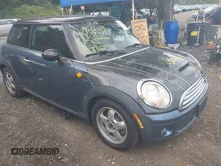 2010 MINI Hardtop with VIN WMWMF3C55ATZ64356, listed as a IAAI auction lot 42754823 with 105,613 mi miles and . Bid and sale history available at DreamBid. Image 1.