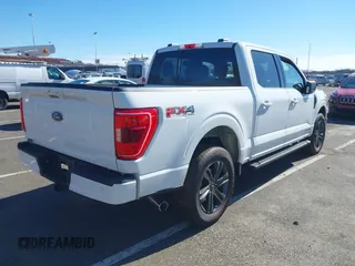2023 Ford F-150 XL with VIN 1FTFW1ED0PFA18306, listed as a IAAI auction lot 41690965 with 49,988 mi miles. Bid and sale history available at carsss.com. Image 4.