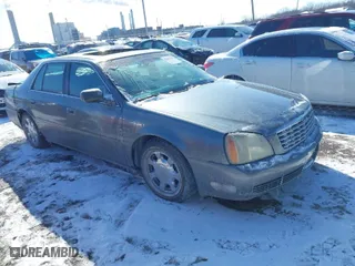 2004 Cadillac DeVille with VIN 1G6KD57Y44U115160, listed as a IAAI auction lot 41602642 with 160,000 mi miles. Bid and sale history available at carsss.com. Image 1.
