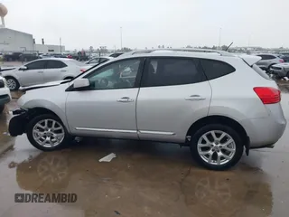2011 Nissan Rogue SV z VIN JN8AS5MT2BW168436, wystawiony jako IAAI lot #41861785 z przebiegiem 174 593 mil mil oraz . Historia ofert i sprzedaży dostępna na DreamBid. Obrazek 14.