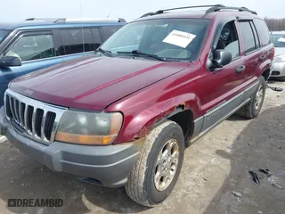 2001 Jeep Grand Cherokee Laredo with VIN 1J4GW48S51C739725, listed as a IAAI auction lot 41800431 with 220,396 mi miles. Bid and sale history available at carsss.com. Image 17.