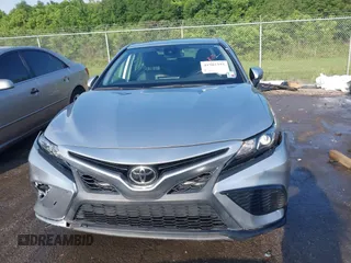 2021 Toyota Camry SE Nightshade with VIN 4T1G11AKXMU599663, listed as a IAAI auction lot 41902392 with 76,909 mi miles. Bid and sale history available at carsss.com. Image 12.