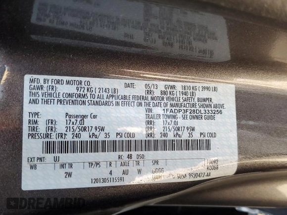 2013 Ford Focus SE with VIN 1FADP3F28DL333256, listed as a Copart auction lot 60438255 with 102,226 mi miles and Clean title. Bid and sale history available at DreamBid. Image 12.