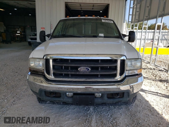 2002 Ford F-350 with VIN 1FDWW37F42EB55737, listed as a Copart auction lot 73678434 with 233,366 mi miles and Salvage title. Bid and sale history available at DreamBid. Image 5.