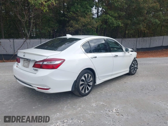 2017 Honda Accord Touring with VIN JHMCR6F73HC004661, listed as a IAAI auction lot 40806581 with 111,692 mi miles and . Bid and sale history available at DreamBid. Image 4.