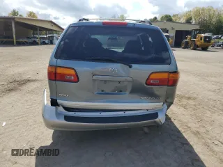 2000 Toyota Sienna LE with VIN 4T3ZF13C2YU286474, listed as a Copart auction lot 74230384 with 118,988 mi miles and Salvage Title. Bid and sale history available at carsss.com. Image 6.