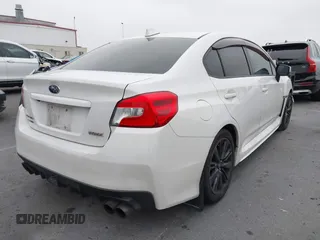 2015 Subaru WRX with VIN JF1VA1A66F9808200, listed as a IAAI auction lot 42141030 with 84,380 mi miles and . Bid and sale history available at DreamBid. Image 4.