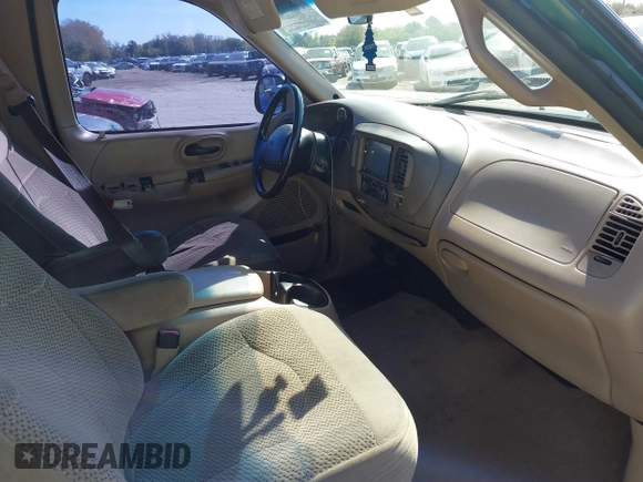 1999 Ford F-150 XL with VIN 2FTRX07W1XCA67223, listed as a IAAI auction lot 41661743 with 1 mi miles. Bid and sale history available at carsss.com. Image 5.