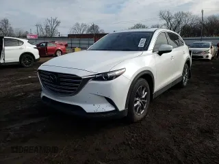 2020 Mazda CX-9 Touring with VIN JM3TCACY2L0407342, listed as a Copart auction lot 47590235 with 59,667 mi miles and Salvage title. Bid and sale history available at DreamBid. Image 12.