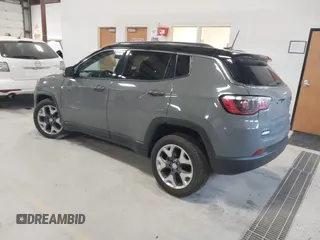 2021 Jeep Compass Limited with VIN 3C4NJDCBXMT596069, listed as a IAAI auction lot 42051527 with 120,236 mi miles and . Bid and sale history available at DreamBid. Image 3.