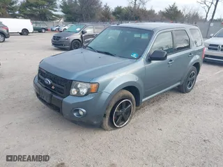 2011 Ford Escape XLT with VIN 1FMCU9DG9BKC38929, listed as a IAAI auction lot 41784854 with 216,201 mi miles. Bid and sale history available at carsss.com. Image 2.