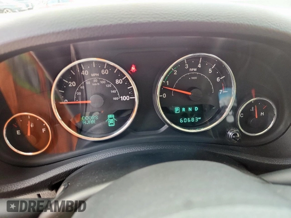 2014 Jeep Wrangler Unlimited Sahara with VIN 1C4BJWEG5EL309502, listed as a Copart auction lot 61804885 with 60,683 mi miles and Salvage title. Bid and sale history available at DreamBid. Image 9.