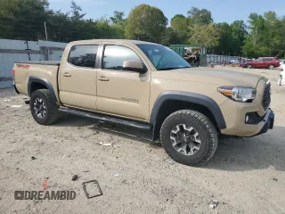 2020 Toyota Tacoma SR5 with VIN 3TMCZ5AN5LM338926, listed as a Copart auction lot 55236145 with 67,409 mi miles and Salvage title. Bid and sale history available at DreamBid. Image 4.