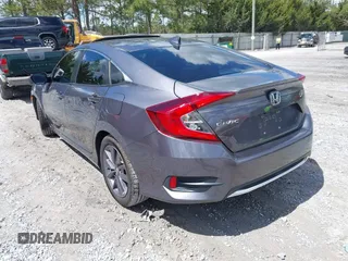 2021 Honda Civic Sedan EX with VIN 19XFC1F33ME012262, listed as a IAAI auction lot 41880047 with 67,861 mi miles. Bid and sale history available at carsss.com. Image 3.