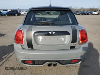 2018 MINI Hardtop 4 Door Cooper S с VIN WMWXU3C58J2F50385, выставлен на аукционе Copart как лот 51168775 с пробегом 77 091 миль миль и Списание • Salvage title. История ставок и продаж доступна на DreamBid. Изображение 6.
