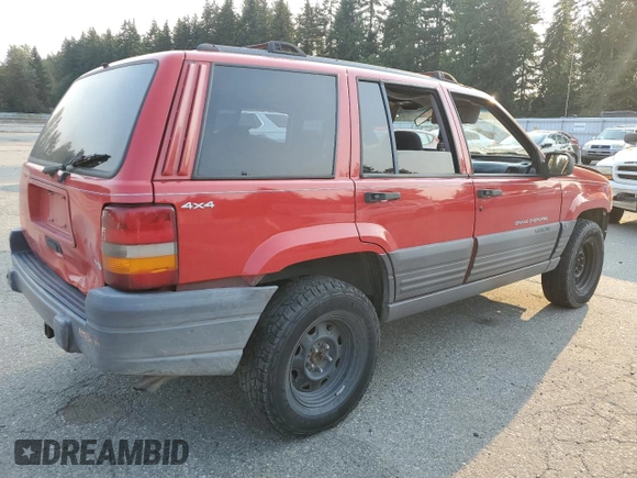 1996 Jeep Grand Cherokee z VIN 1J4EZ58Y5TC142263, wystawiony jako Copart lot #70532894 z przebiegiem Nie podano mil oraz Szkoda całkowita • Salvage title. Historia ofert i sprzedaży dostępna na DreamBid. Obrazek 3.