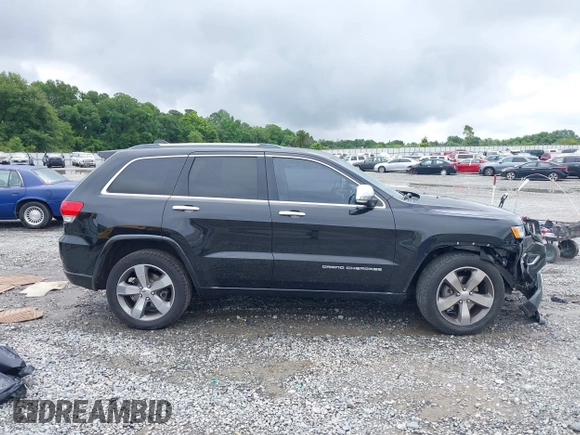 2015 Jeep Grand Cherokee Overland with VIN 1C4RJECG3FC152601, listed as a IAAI auction lot 42414340 with 139,315 mi miles and . Bid and sale history available at DreamBid. Image 13.