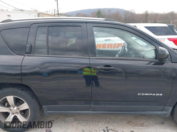 2017 Jeep Compass High Altitude with VIN 1C4NJDEB0HD192822, listed as a IAAI auction lot 41718475 with 97,716 mi miles. Bid and sale history available at carsss.com. Image 13.