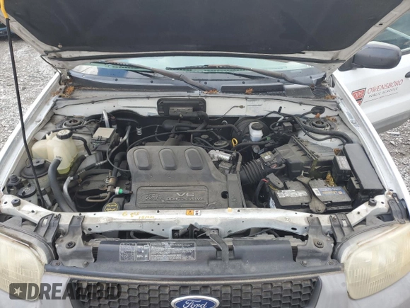 2001 Ford Escape XLS with VIN 1FMYU02161KB01283, listed as a Copart auction lot 59145105 with 86,195 mi miles and Salvage title. Bid and sale history available at DreamBid. Image 12.