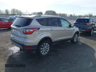 2017 Ford Escape Titanium with VIN 1FMCU0JD3HUB19602, listed as a IAAI auction lot 41816296 with 70,311 mi miles. Bid and sale history available at carsss.com. Image 4.