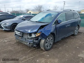 2014 Honda Odyssey Touring with VIN 5FNRL5H95EB048617, listed as a IAAI auction lot 41735376 with NaN miles. Bid and sale history available at carsss.com. Image 17.