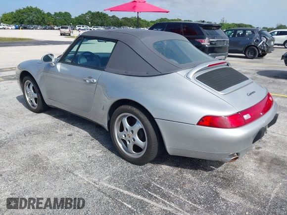 1998 Porsche 911 Carrera with VIN WP0CA2992WS340996, listed as a IAAI auction lot 42002177 with 47,222 mi miles. Bid and sale history available at carsss.com. Image 3.