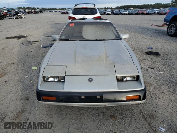 1984 Nissan 300ZX z VIN JN1HZ16S5EX016042, wystawiony jako Copart lot #86071904 z przebiegiem Nie podano mil oraz Szkoda całkowita • Salvage title. Historia ofert i sprzedaży dostępna na DreamBid. Obrazek 5.