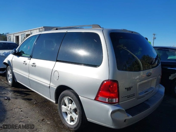 2007 Ford Freestar Wagon SEL with VIN 2FMDA52297BA31987, listed as a IAAI auction lot 41385567 with 133,154 mi miles. Bid and sale history available at carsss.com. Image 3.