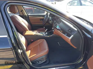 2012 BMW 5 Series 528i with VIN WBAXG5C53CDW66455, listed as a IAAI auction lot 41749708 with 178,595 mi miles. Bid and sale history available at carsss.com. Image 5.