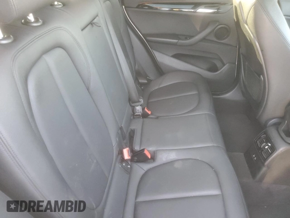 2019 BMW X1 sDrive28i with VIN WBXHU7C59K3H46543, listed as a Copart auction lot 49720815 with 97,836 mi miles and Clean Title. Bid and sale history available at carsss.com. Image 10.