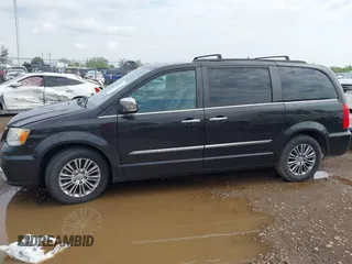 2014 Chrysler Town & Country Touring L with VIN 2C4RC1CG5ER378194, listed as a IAAI auction lot 42176454 with 178,448 mi miles and . Bid and sale history available at carsss.com. Image 14.