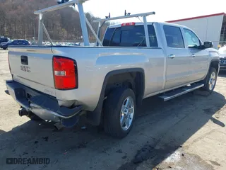 2015 GMC Sierra 2500HD Denali with VIN 1GT120EG3FF135791, listed as a IAAI auction lot 41854102 with 93,186 mi miles. Bid and sale history available at carsss.com. Image 4.